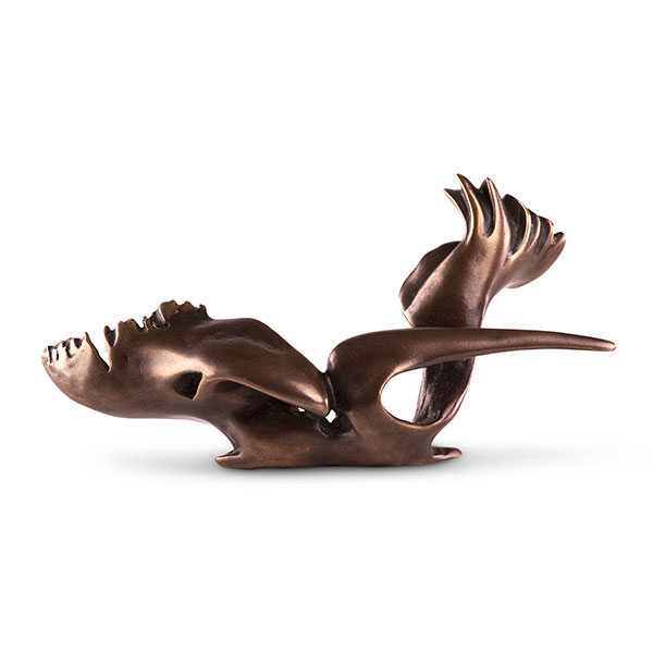Miniature titled Swamp Seraph is made of bronze in a dark brown color. It shows a powerful bird seated with strong wings and a long beak.